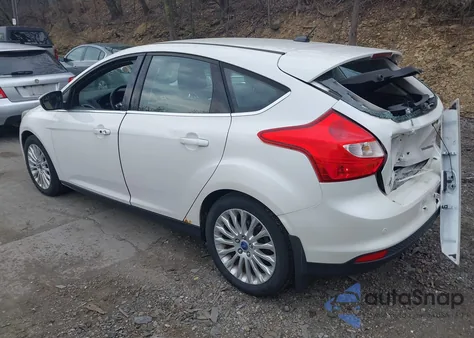 2012 Ford Focus Titanium z USA, uszkodzony, nr VIN 1FAHP3N26CL183004